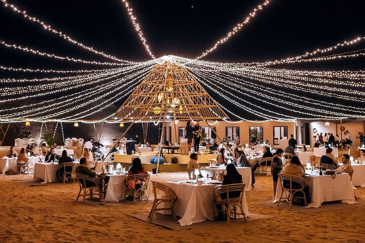 Dine under twinkling lights in the heart of the desert where savory dishes captivating performances and starlit movie nights create lasting memories for every traveler.